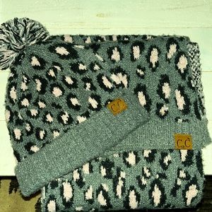 CC Pom Pom Hat and matching scarf. Animal print. Great condition!